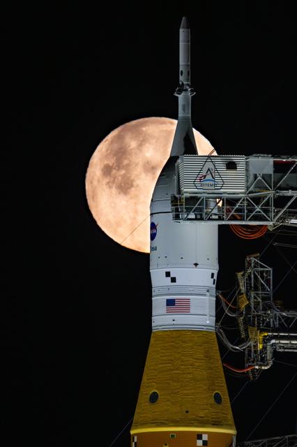 NASA image: Full Moon Rising Over Full Artemis II Stack at Launch Pad 39B
